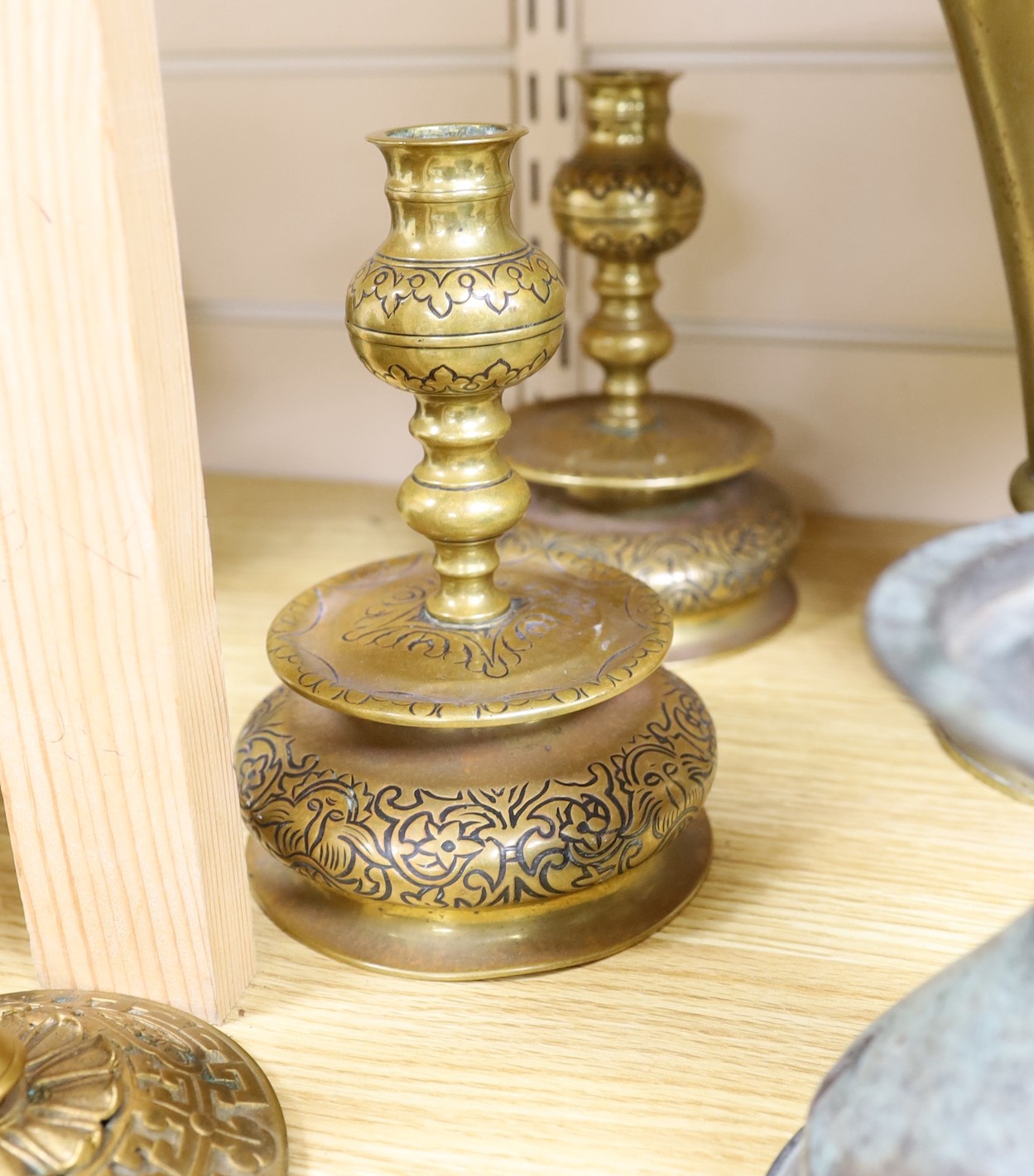 A Continental gilt brass casket, a pair of brass candlesticks, a pewter casket, another candlestick, a vase and a JVB hook (6)